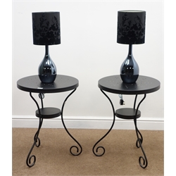  Pair black wrought metal circular occasional tables H65cm x D49cm, a pair of black ceramic table lamps and one other  
