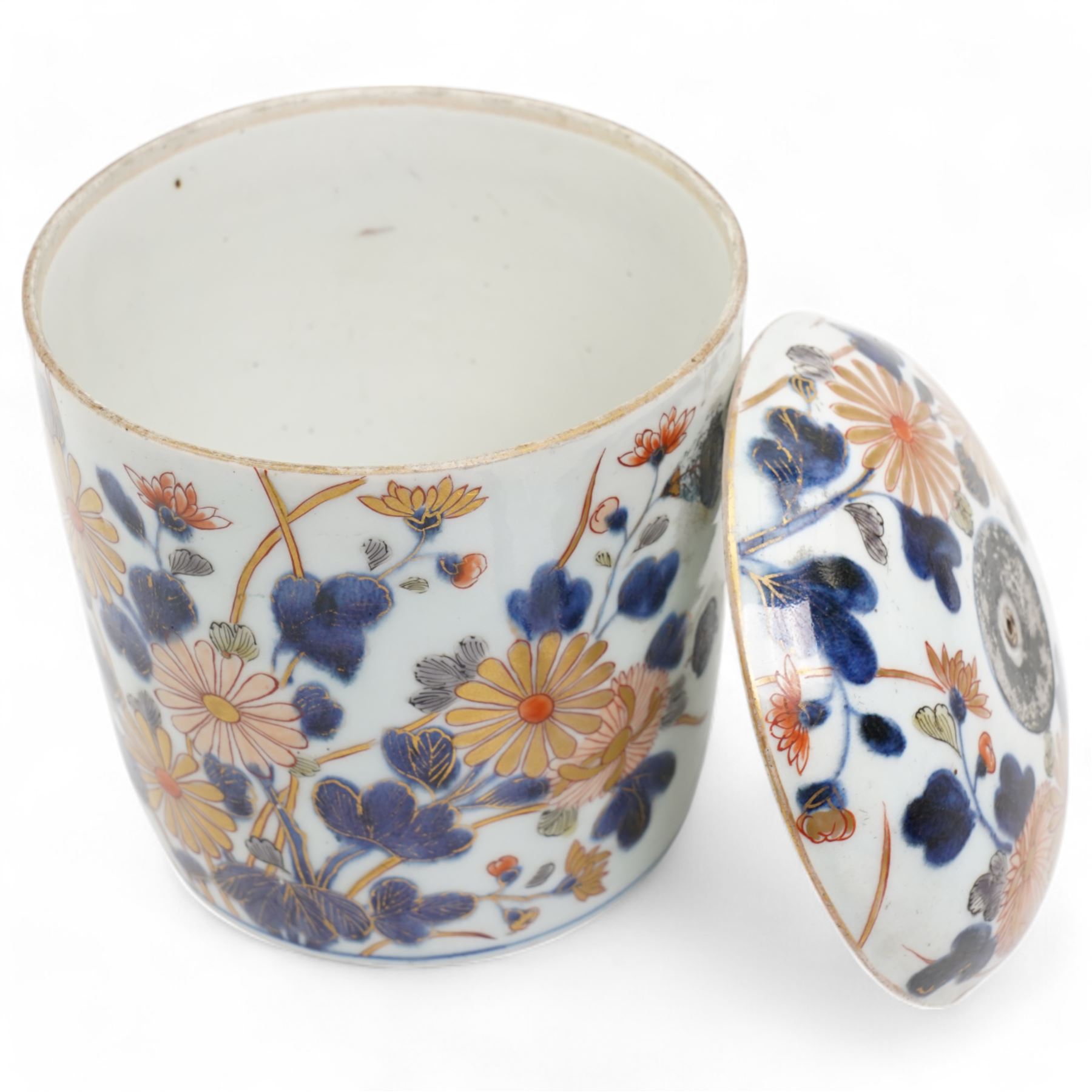 Japanese Edo period, 18th century porcelain jar and cover, decorated in the imari palette with branches of chrysanthemums, H18cm x D13.5cm 