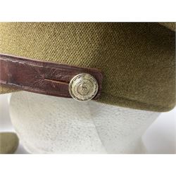 Early 20th century British army peaked cap with Scots Guards brass badge; another later with Scots Guards Staybrite badge; modern pith helmet; British army water bottle with later webbing cover; pair of Carl Zeiss blc 7 x 50 binoculars; and Dunn & Co bowler hat