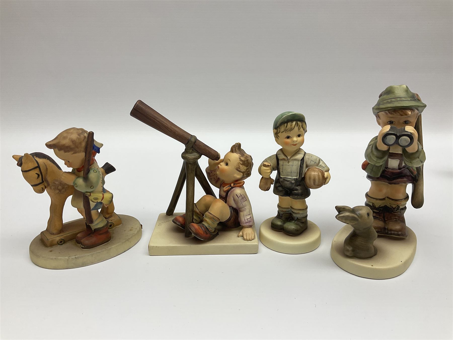 Twenty six Hummel figures by Goebel, to include Fire Fighter, Band Leader and Spring Sowing