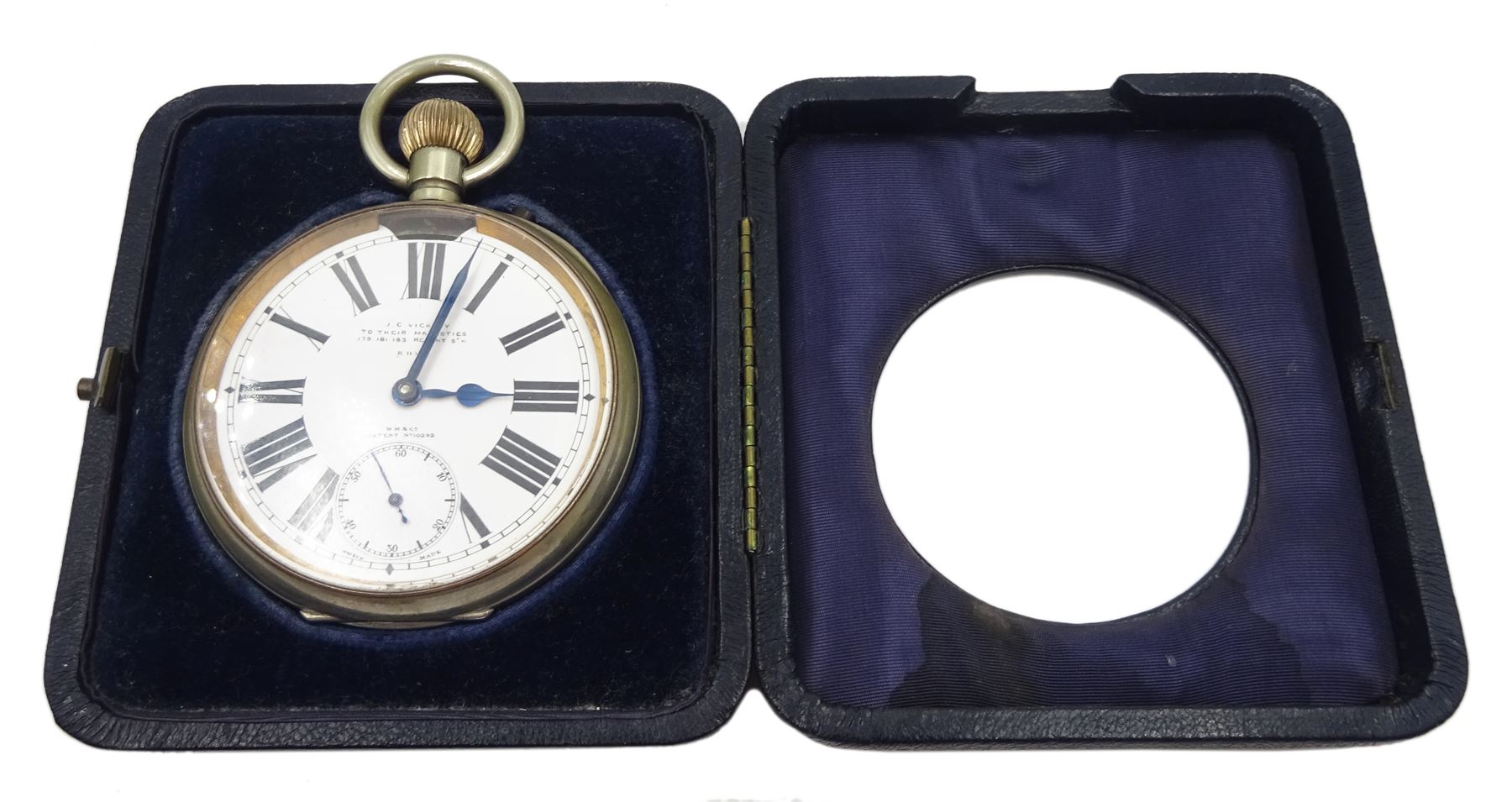Early 20th century goliath keyless Swiss lever pocket watch by M M & Co, patent No. 10292, retailed by J. C. Vickery 'To Their Majesties 179-181-183 Regent Street', with light attachment, white enamel dial with Arabic numerals and subsidiary seconds dial, case No. 3499292, in fitted case