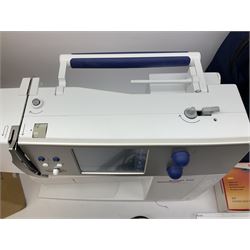 Bernina 'Artista' 630 computerised sewing machine with stitch regulator, carrying case, instruction booklet and accessories, in original box