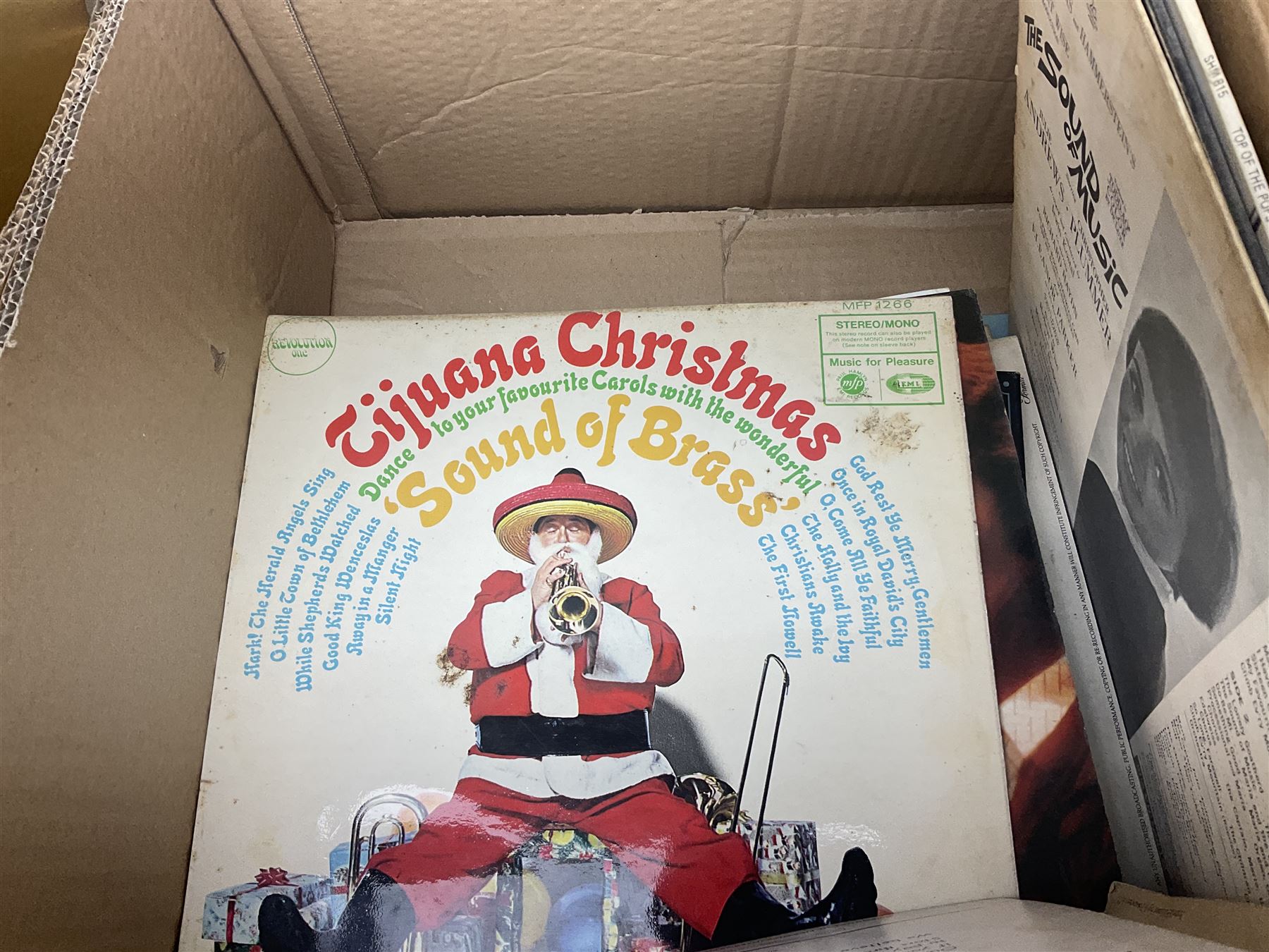 Clear glass demijohn / carboy, four wine bottles with wicker baskets, W T Avery & Co scales, Singer sewing machine, quantity of costume jewellery, trophy stand with silver-plate shields, quantity of vinyl records, stamps etc