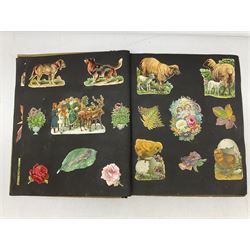 Victorian scrapbook containing twenty-six double sided pages and two fixed end pages of various fixed decoupage to include clippings of maritime interest, greeting cards, portraiture, flowers, animals etc, 