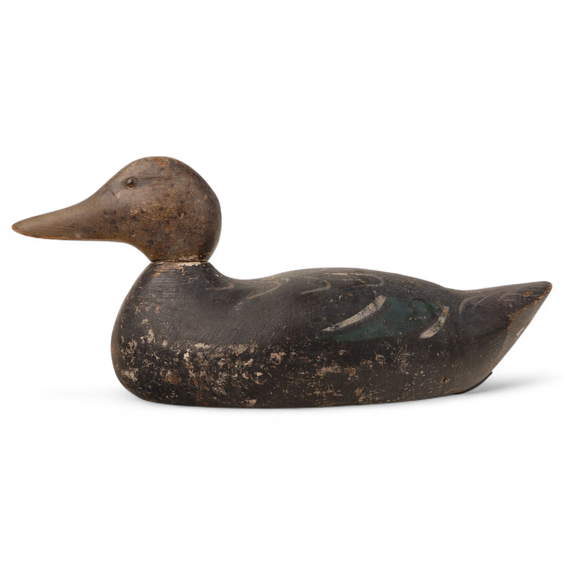 Early 20th century American carved wooden decoy duck, with weight beneath marked CJ Raymond Lead Co Chicago, H19cm, L40cm
