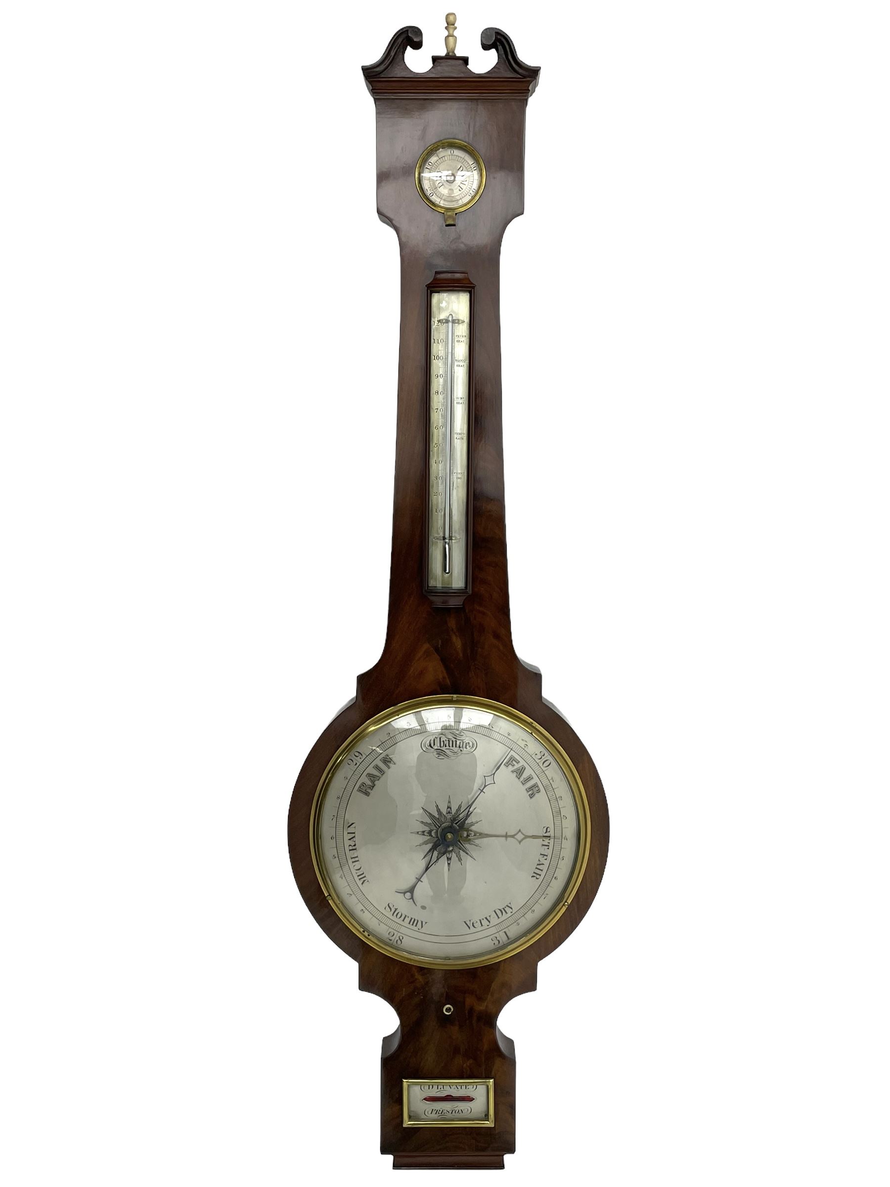 D Luvate of Preston - early Victorian mahogany mercury wheel barometer c1840, with a swan’s neck pediment and cavetto moulded square base, 8-inch silvered register calibrated in inches with a decorative star engraved centre, cast brass bezel and convex glass, with a steel indicating hand and brass recording hand, beneath a bowfronted Fahrenheit scale thermometer and hygrometer, rectangular spirit level signed D LUVATE, PRESTON.
Lacking recording hand button.
H109
Dominic Luvate is recorded as working as a barometer and looking glass maker in Friargate, Preston 1820-45
