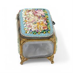 Micro mosaic jewellery casket with bevelled glass sides, the hinged lid decorated with with multicoloured raised flowers upon a blue ground, raised upon pierced gilt feet H10cm, L15cm