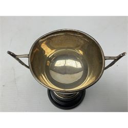 1930's silver twin handled trophy cup, upon black circular plinth, hallmarked Birmingham 1936, approximate silver weight 47 grams