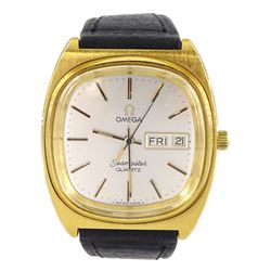 Omega Seamaster gentleman's gold plated and stainless steel quartz wristwatch, Cal 1345, silvered dial with day / date aperture, on black leather strap with original gilt buckle