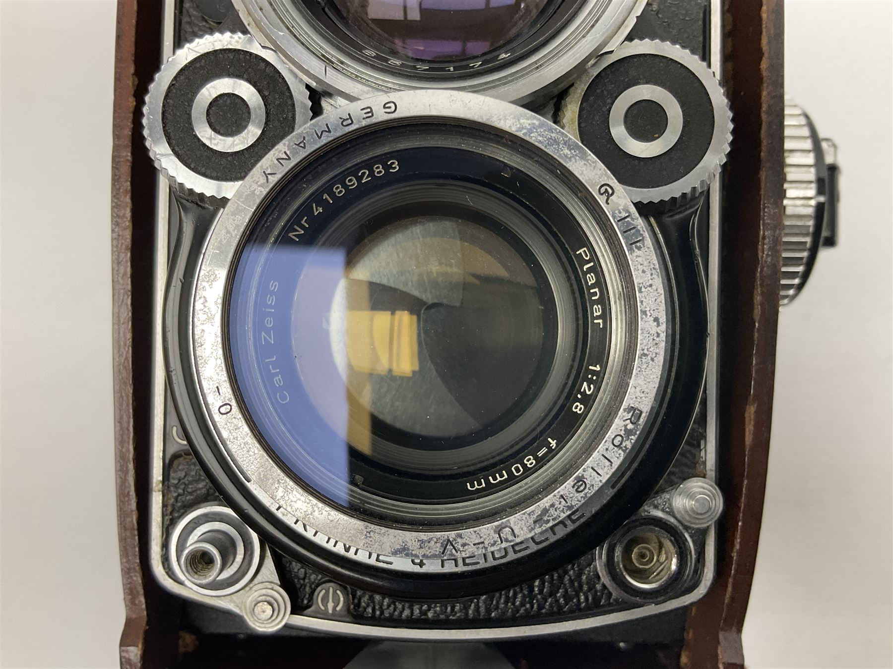 Franke & Heidecke Synchro-Compur Rolleiflex camera, twin lens camera, serial number 2447615, with viewing lens '1:2.8/80 Heidosmat No. 857174', Taking Lens '1:2.8/80 Carl Zeiss Planar No. 4189283', in leather case