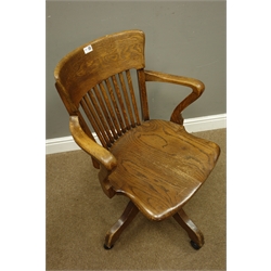  Early 20th century oak office swivel desk chair, W59cm  