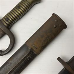 WWI Remington Pattern 1913 bayonet, the 43cm fullered blade with various marks to the ricasso including date code 11 16; in leather covered scabbard with various stamps including JWB 17 L58cm overall; and a French Model 1866 sabre bayonet (no scabbard)