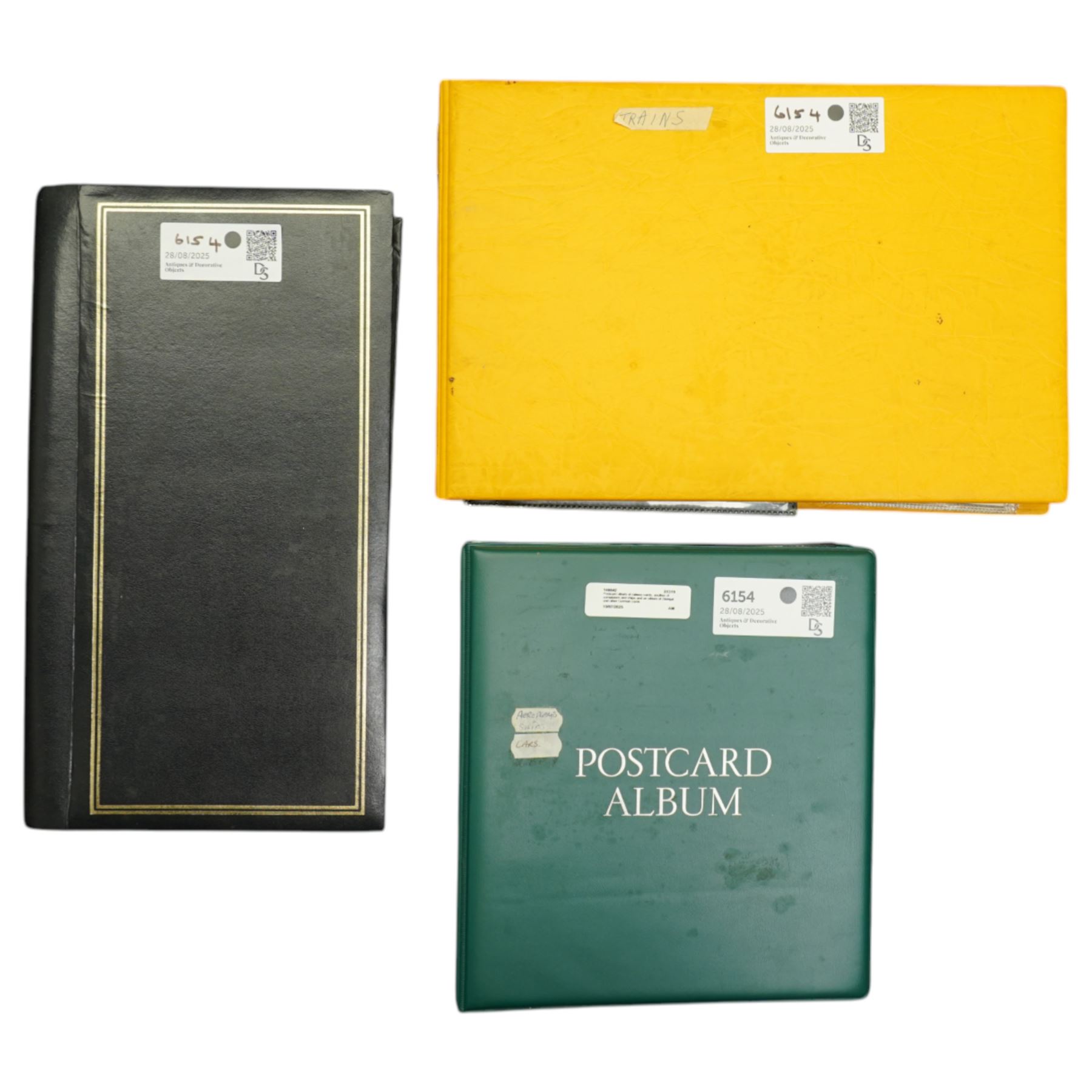Postcard album of railway cards, another of aeroplanes and ships and an album of Stengal and other German cards