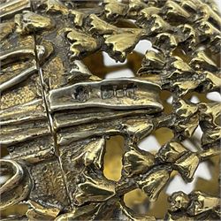 Modern silver limited edition Easter egg, no. 70/500, the gilt openwork body decorated with cascading bluebells and hinged cover with pierced circular panel set with a single faceted purple stone, opening to reveal a gilt interior, upon silver stand with three scrolling pad feet, each hallmarked St James House Company, London 1981, height including stand 8cm