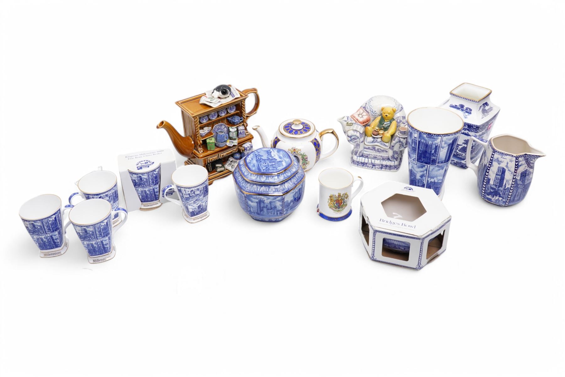Ringtons items including novelty teapot Millenium Welsh Dresser, another Tea Time, tea caddy, Willow Story vase, Landmarks vase, five Millenium beakers etc