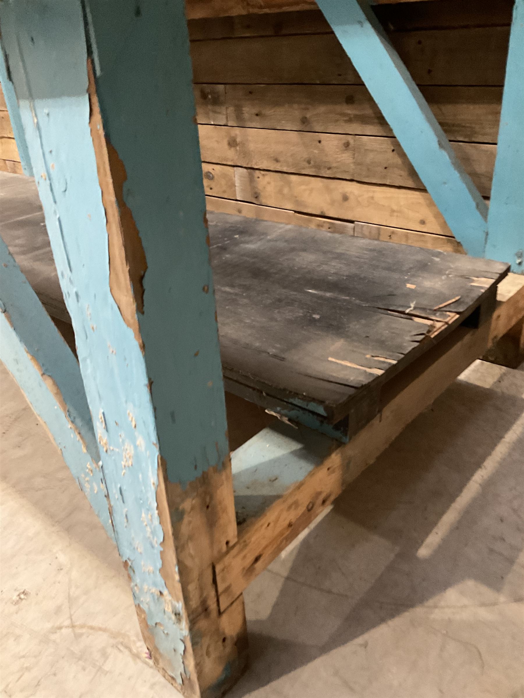 Large timber work bench with central glass section, and two pairs of vintage wooden step ladders (3)