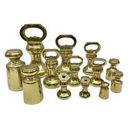 Graduated set of eight brass bell weight