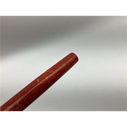 Vintage Swan Mabie Todd lever fill fountain pen in coral red, the nib a/f marked 14K, together with two further vintage Swan Mabie Todd fountain pens, the first example with lever fill, the other leverless, each with black body, one with nib marked 14ct, (3) 