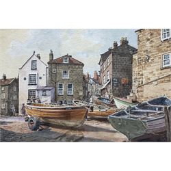 John Cecil Lund (British 1932-): Cobles at Robin Hood's Bay, watercolour signed 18cm x 27cm