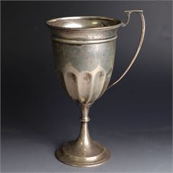 1930s silver trophy cup, of typical part fluted form with presentation engraving to body, with twin handles, one broken loose, hallmarked 	Charles Boyton & Son Ltd, London 1931, H21cm