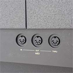 Yamaha Clavinova CLP-550 digital piano, full-size weighted keyboard with integrated pedals and speakers, in dark wood effect casing, accompanied by matching padded bench, Sennheiser headphones, original manuals, and factory-issued cassette tape titled 'Pure & Simple – CLP Digital Pianos'