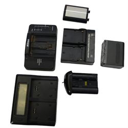 Nikon D2x digital SLR camera body, serial no. 5020627, with some associated battery packs and accessories