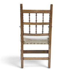 Rupert Griffiths for Monastic Woodcraft - oak 6ft refectory dining table with set six (4+2) matching chairs, rectangular top with arcaded frieze, with trestle base with further arcaded carved stretchers, chairs with carved rails and finials, leather wrapped seats with stud detail, turned supports united by carved stretcher
