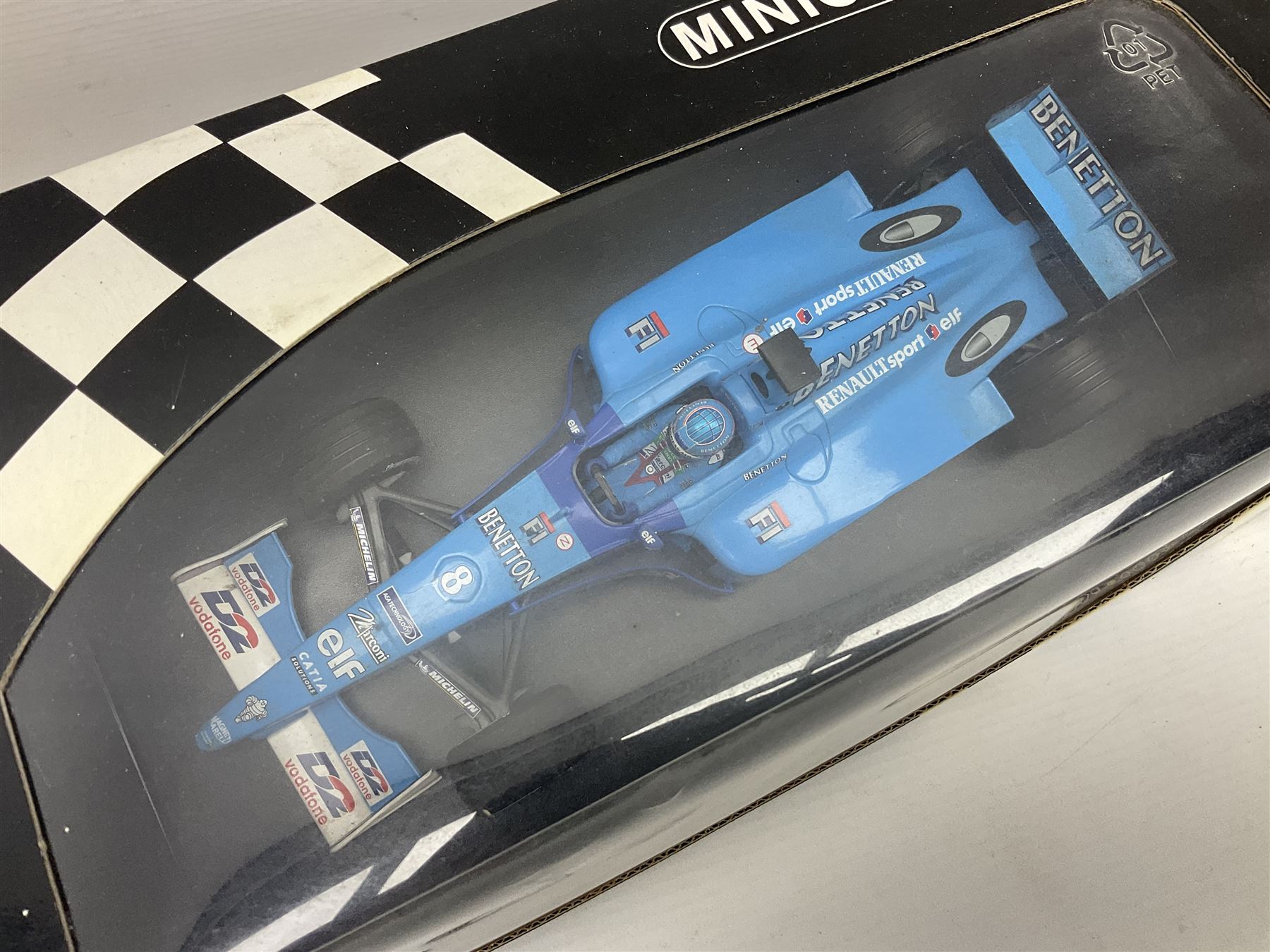 Three Minichamps 1:18 scale die-cast racing cars - B.A.R. Honda 006 J. Button; limited edition Benetton Renault Sport Showcar 2001 J. Button; and limited edition Benetton Renault Sport Showcar 2001 G. Fisichella; all boxed (3)