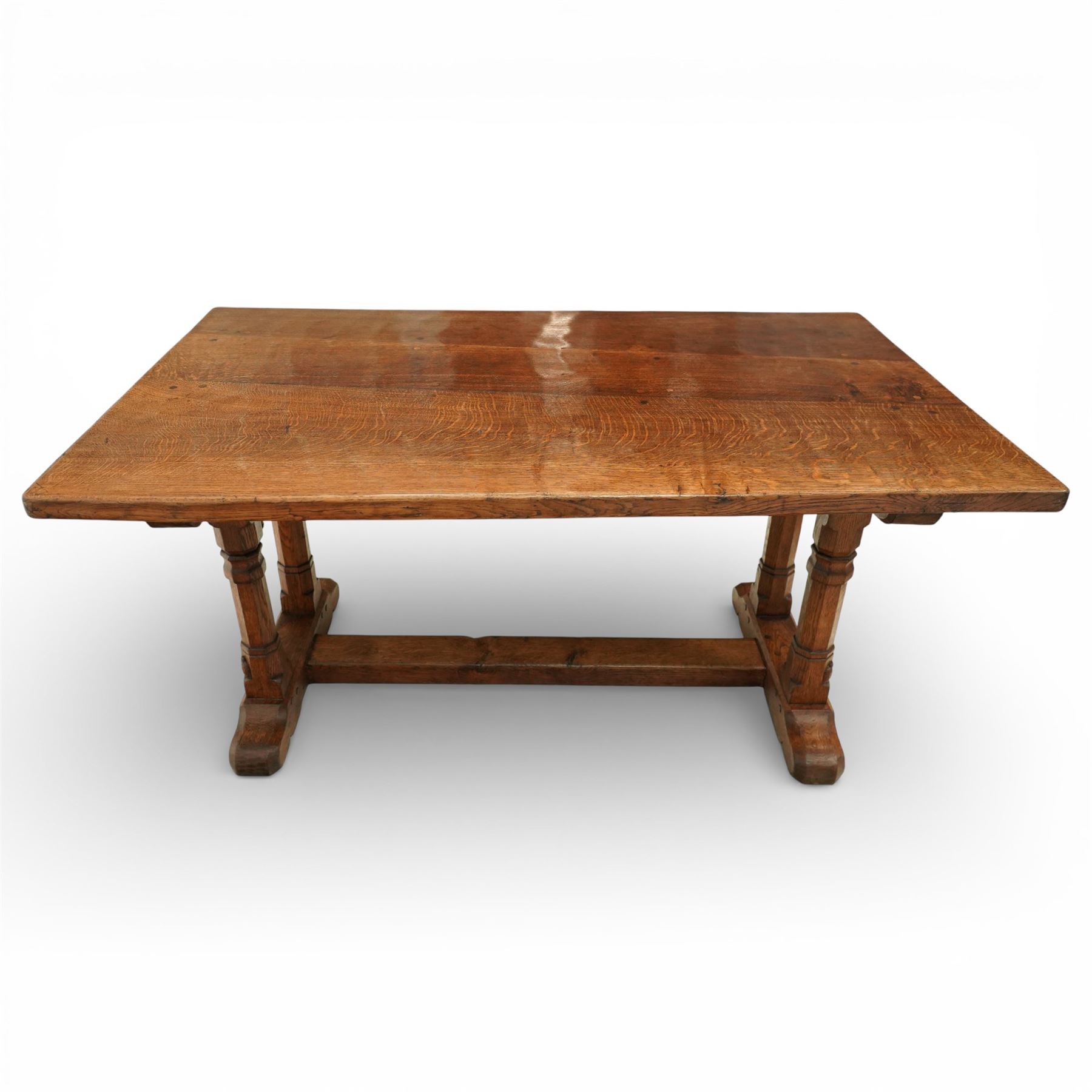 Mouseman - 1937 refectory table, Sir Herbert Baker commission for Westminster Church House, the rectangular adzed plank top above twin octagonal baluster supports united by a pegged stretcher, raised on shaped sled bases carved with a partridge and a loaf of bread, with carved mouse signature to inside leg, by Robert Thompson of Kilburn

The carved loaves reference the original patron, while the partridges are thought to represent Frank Partridge, Bishop of Portsmouth from 1877 to 1941, who played a key role in the founding of Church House and served as its Secretary from 1936 until 1941

Reference
Christie’s ROBERT “MOUSEMAN” THOMPSON; Refectory Table, Lot 188, sold at Christie’s London, commissioned by Sir Herbert Baker KCIE, RA, architect of Church House (opened 1937). Provenance and description available on the Christie’s website
https://www.christies.com/en/lot/lot-4618786