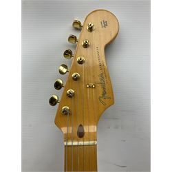 Fender Stratocaster 50th Anniversary 2004 metallic gold electric guitar; serial no.MZ4116369; L98cm; in Spider fitted case with owners manual and other paperwork, strap and belt buckle etc