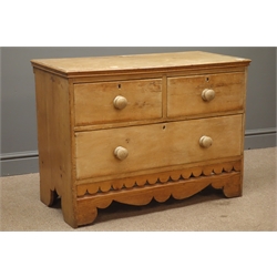  Early 20th century pine chest, two short and one long drawer solid end supports, pierced and shaped apron, W89cm, H69cm, D45cm  