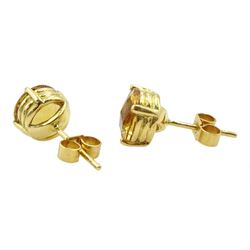 Pair of 18ct gold round citrine stud earrings, stamped 750
