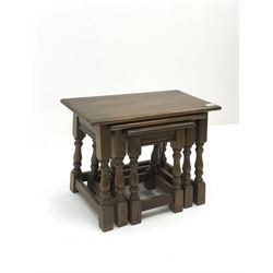 Medium oak nest of three Joint style tables 