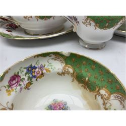 Paragon Rockingham pattern part tea and dinner service including three teapots, milk jug, cups and saucers of various sizes, ten soup bowls, ten side plates, ten dinner plates etc (96)