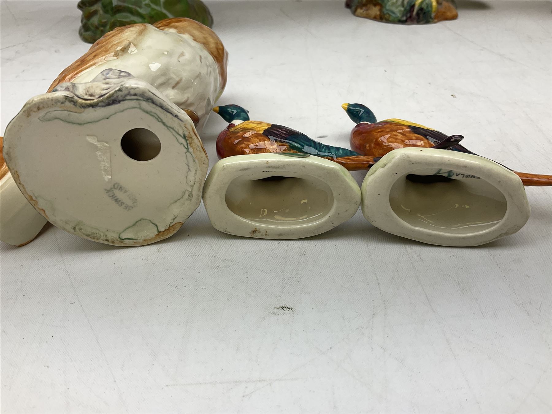 Six Beswick bird figures comprising large barn owl no.1046, small barn owl no.2026, woodpecker no.1218, pheasant no. 1226b and two small pheasants no.767a, tallest H22cm  