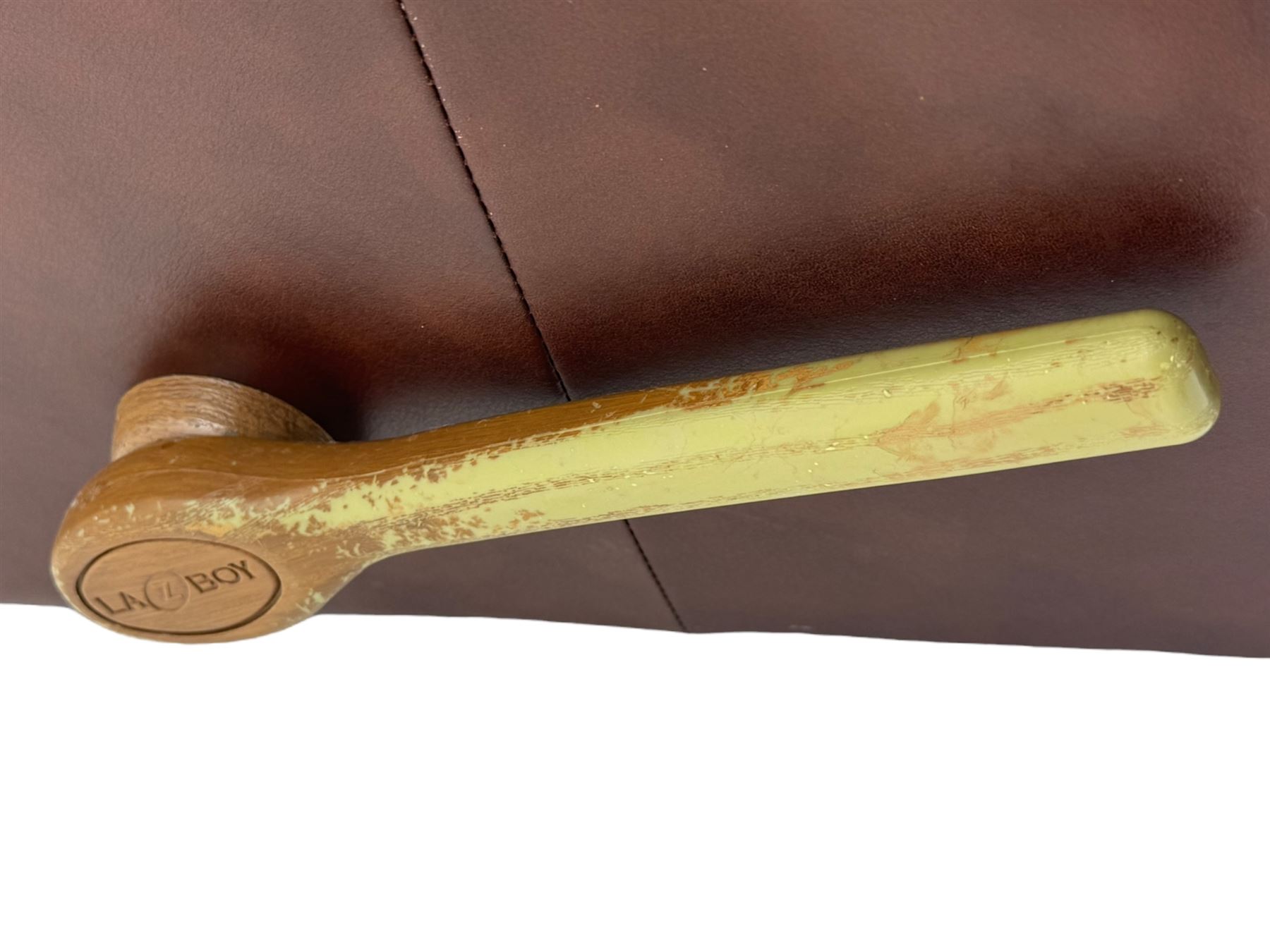 La-Z-Boy - manual reclining three piece suite - two seater sofa (W165cm, H105cm); and two armchairs (W98cm), upholstered in brown leatherette