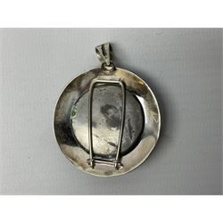 Silver pendant, with a green/green enamel centre with gold leaf detail
