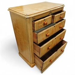 19th century pine painted chest of drawers, rectangular moulded top above two short and three graduated long drawers, each with painted foliate scroll and line detailing, turned knobs, and concealed turned feet, the sides with rounded corners and ebonised detail
