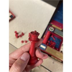 19th century walnut and brass bound games compendium box, painted to enhance the grain, of rectangular form, the hinged opening cover with rounded sides, central brass cartouche with engraved lion crest, and brass riveted straps, opening to reveal a red leather and blue silk lined compartmented interior, with fold-down games board, and lift-out tray containing playing cards, ebony turned dice towers, white and red stained bone draughts, and chess pieces, ivory dice, and ivory and ebony whist markers, and brass bezique board, cribbage board and markers, H15cm W32cm D24cm
This lot has been registered for sale under Section 10 of the APHA Ivory Act