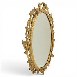 Rococo design gilt framed oval wall mirror, pierced frame with foliate design 