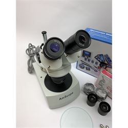 AmScope microscope, with various eyepieces and other accessories 