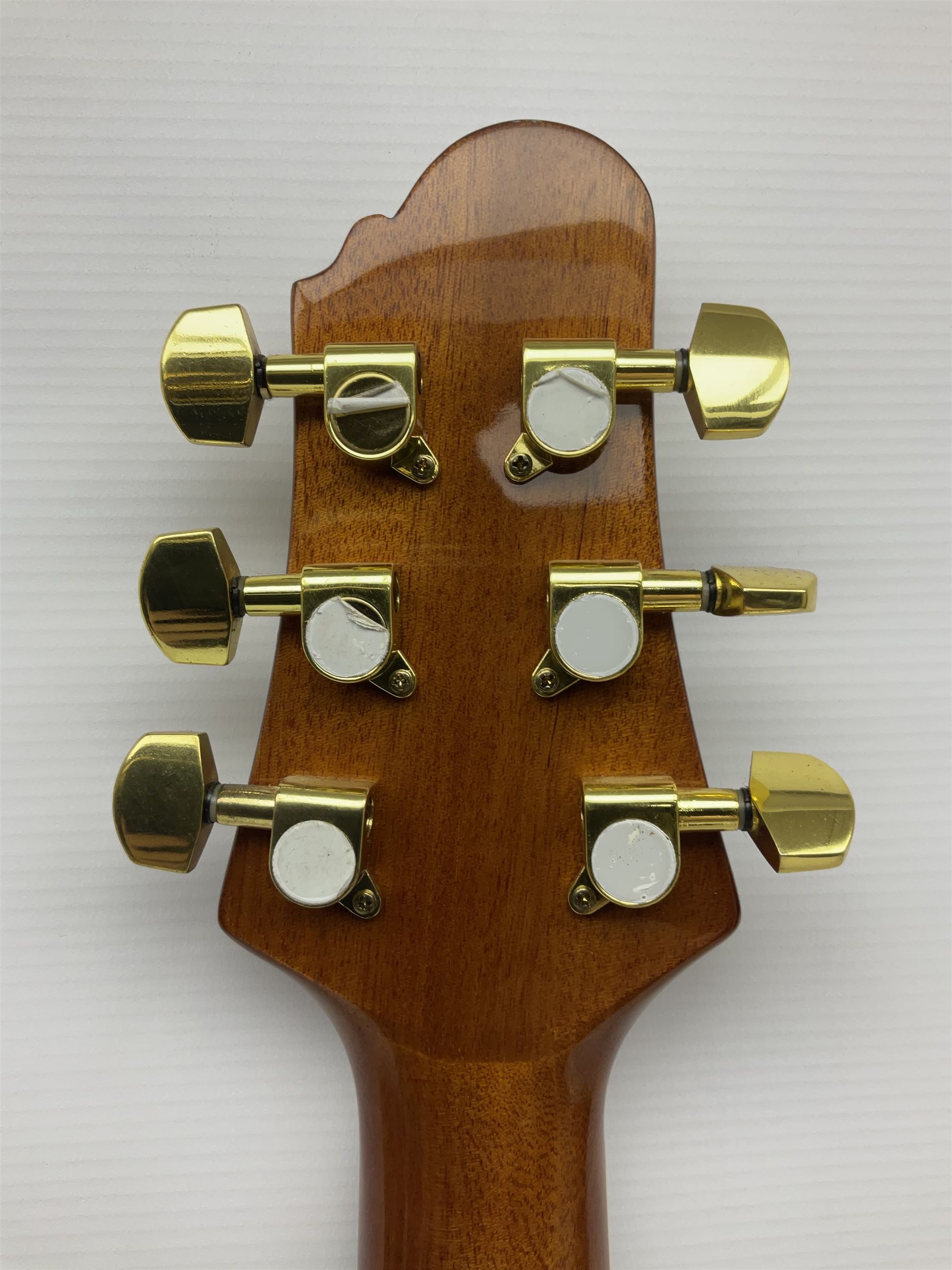 Woodstock model no.WHW41J203 acoustic guitar with mahogany back and sides and spruce top, serial no.2835 L102.5cm; in soft carrying case