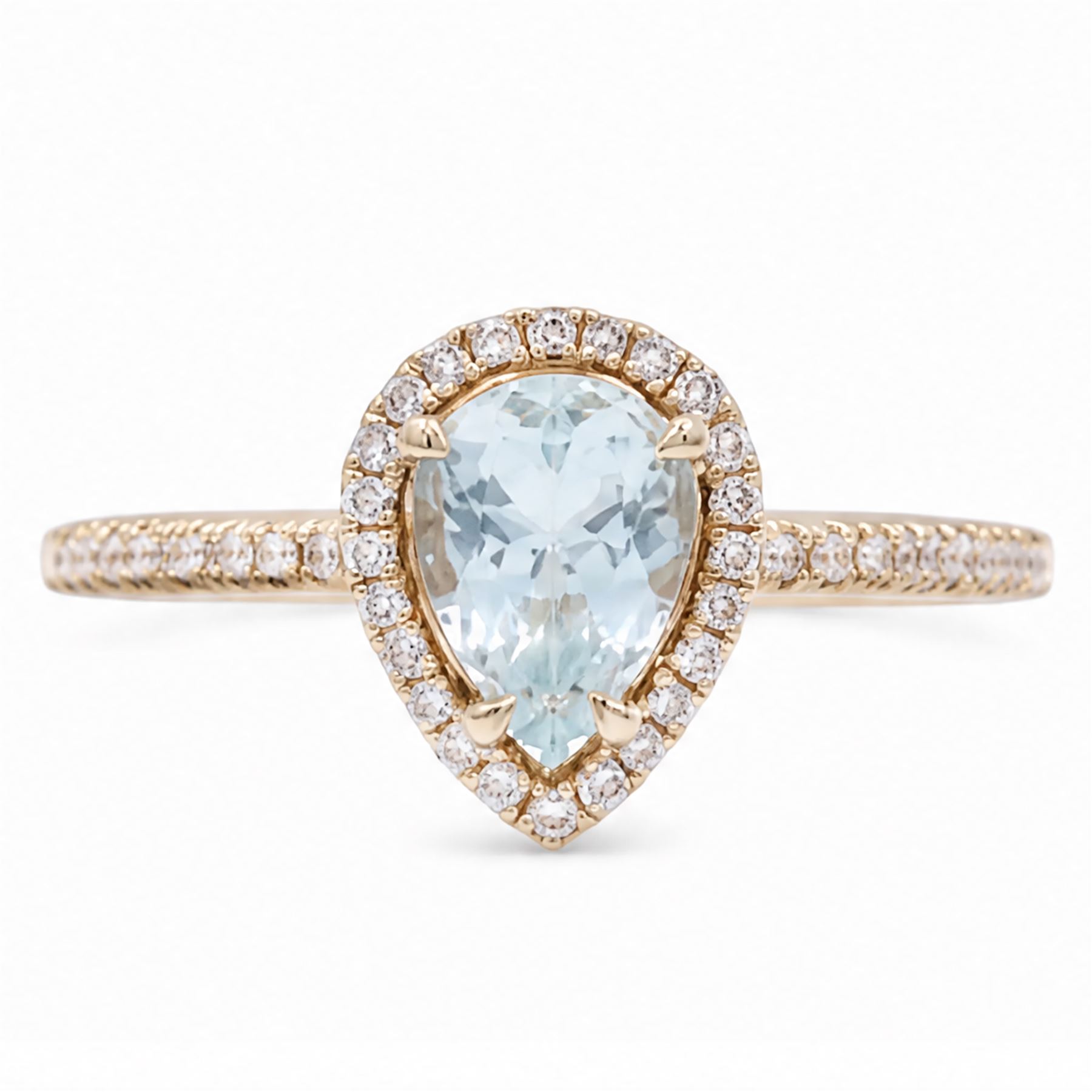 18ct gold aquamarine and diamond cluster ring, single pear cut aquamarine of approx 0.80 carat, surrounded by round brilliant cut diamonds and diamond set shoulders, London 2015