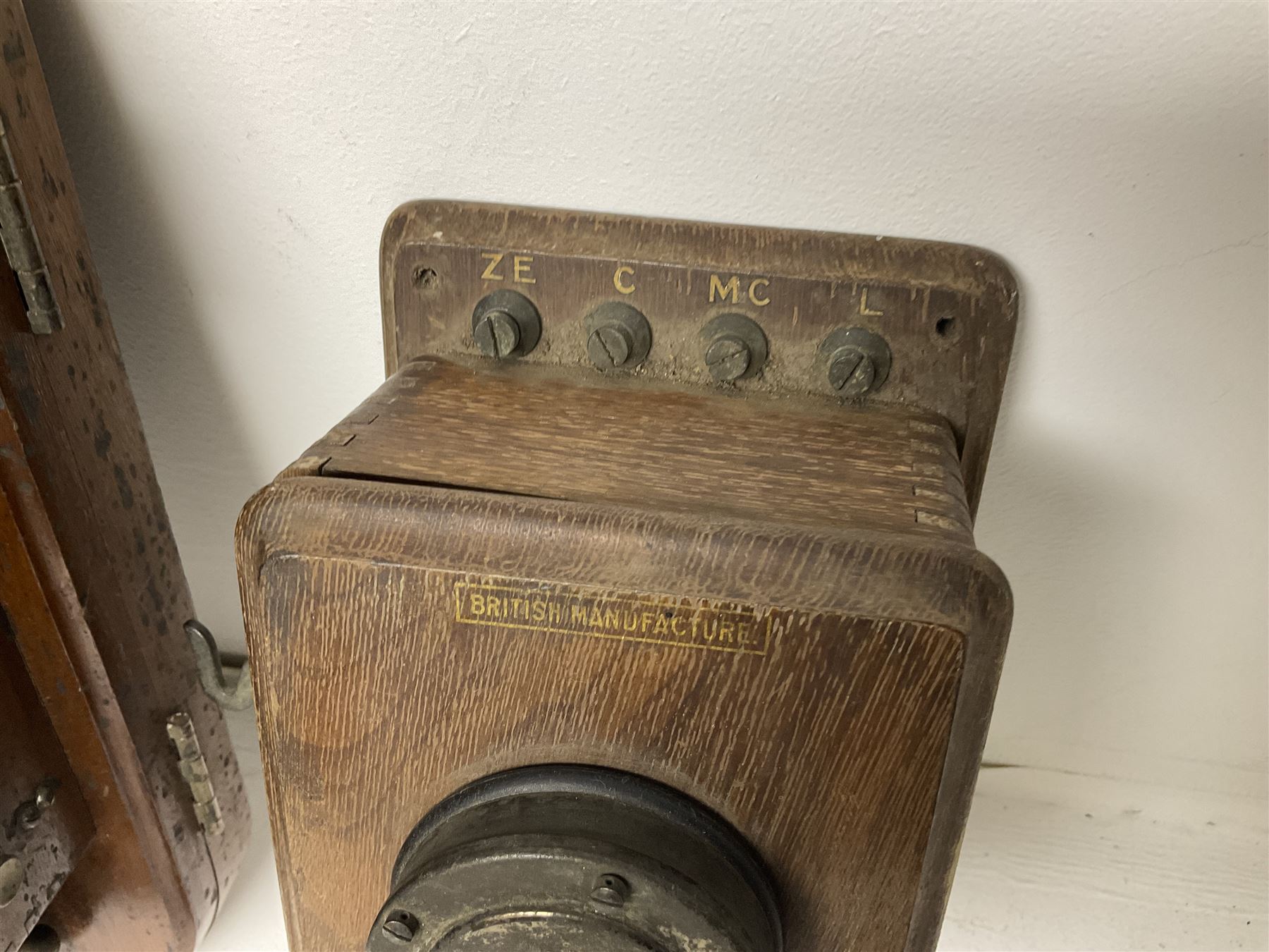 Two Hunningscone patent wall mounting telephones in walnut casing, together with Sterling Telephone & Electric Co. Ltd early wall-mounted telephone 'Primax' and one other 