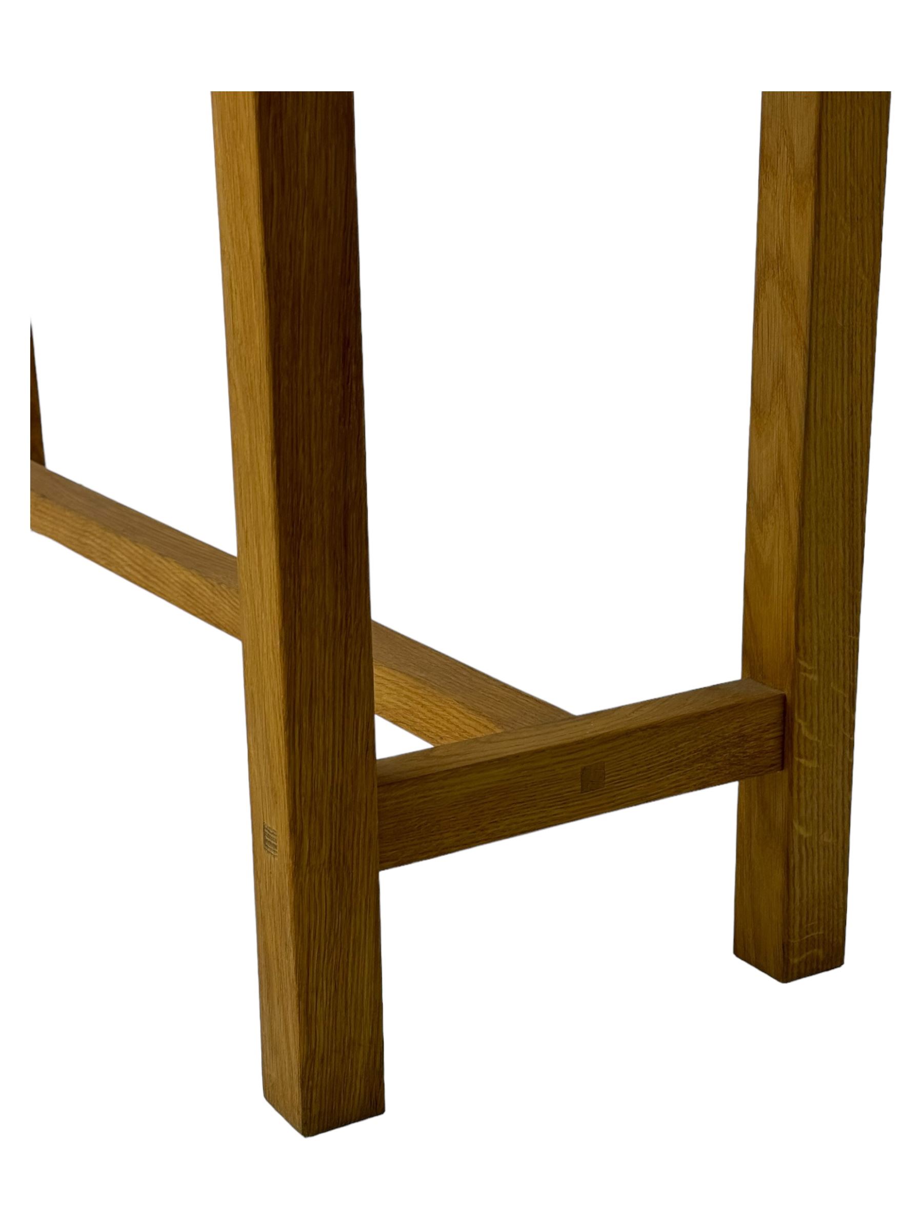 Laura Ashley - contemporary light oak console table, rectangular top over four drawers, on rectangular supports united by stretcher