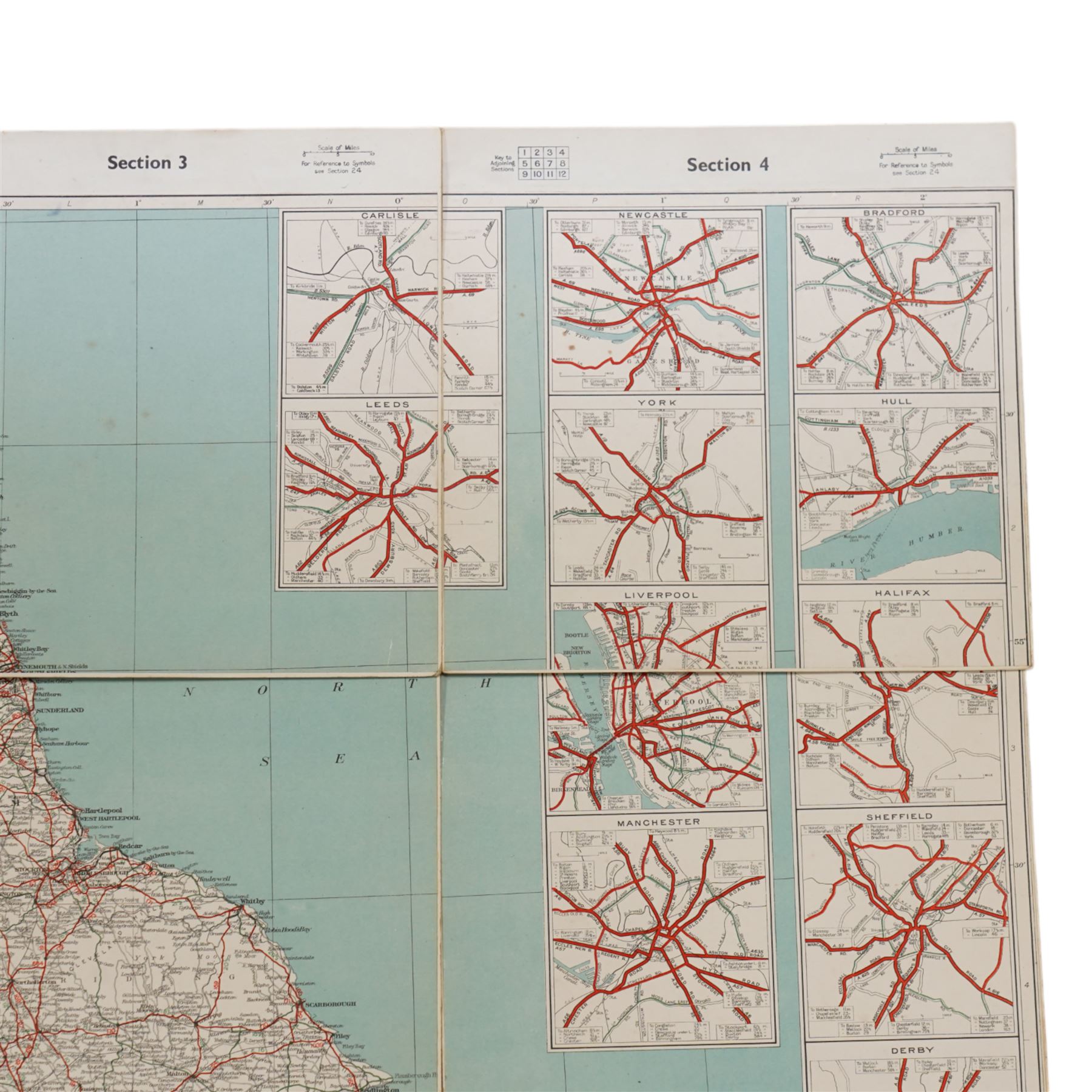 William G Nutland (British Military 20th century): Nuclear War Town Exit Plan Map: Civil Defence and Government Continuity in the Event of a Nuclear Attack on the UK, mid-20th century printed twenty-four sectional map with hand-colouring based upon the OS maps with sanction of the Controller of H.M. Stationery Office, circa 1950s or 1960s as part of a contingency during the Cold War 72cm x 100cm (unframed)