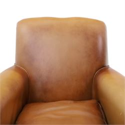 Pair of brown faux leather tub armchairs, scrolled arms with studded detail, turned front feet