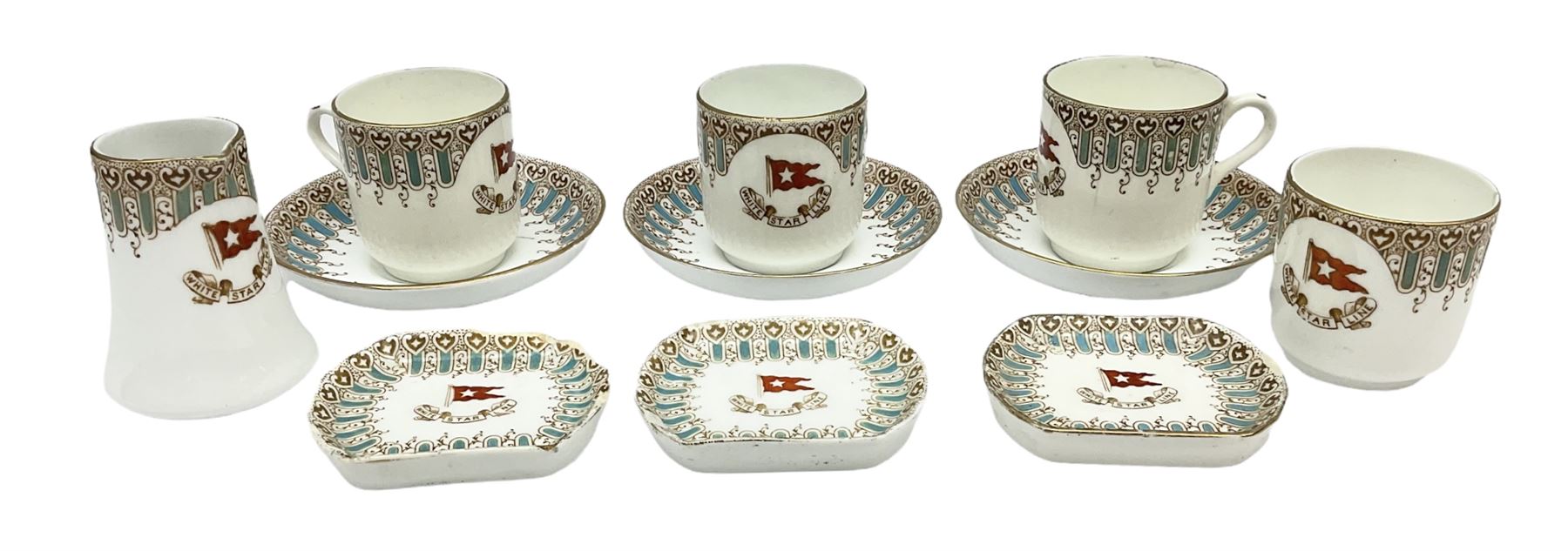 White Star Line, six pieces of porcelain by Stonier & Co. Liverpool, comprising four tea cups, three saucers, jug and three pin trays, registered design no. 117214/324028, printed mark beneath 