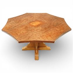 Sid Pollard of Thirsk - octagonal oak adzed dining table, with curved edges on a quatriform base