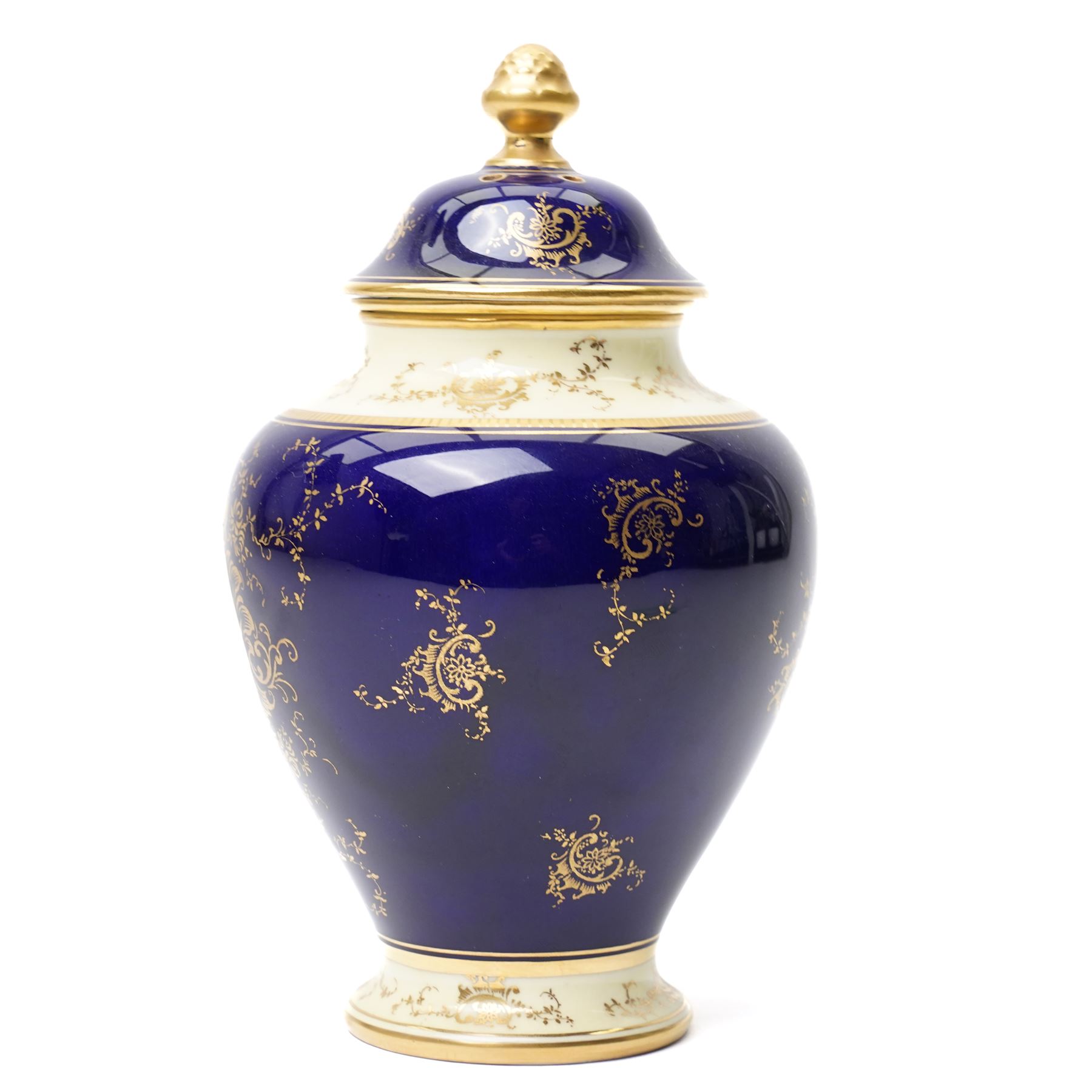 Coalport pot pourri jar and cover, circa 1920, the dark blue ground painted with landscape panels of Helvelly by E.O. (Ted) Ball, printed and painted marks to base, H17cm